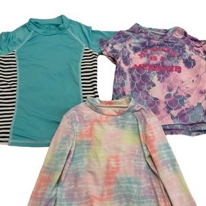 Bundle swim shirts size 6 youth